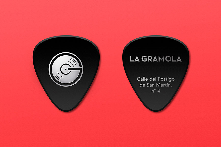 Front and back of a guitar pick mockup showing the logo and information of a Record store.